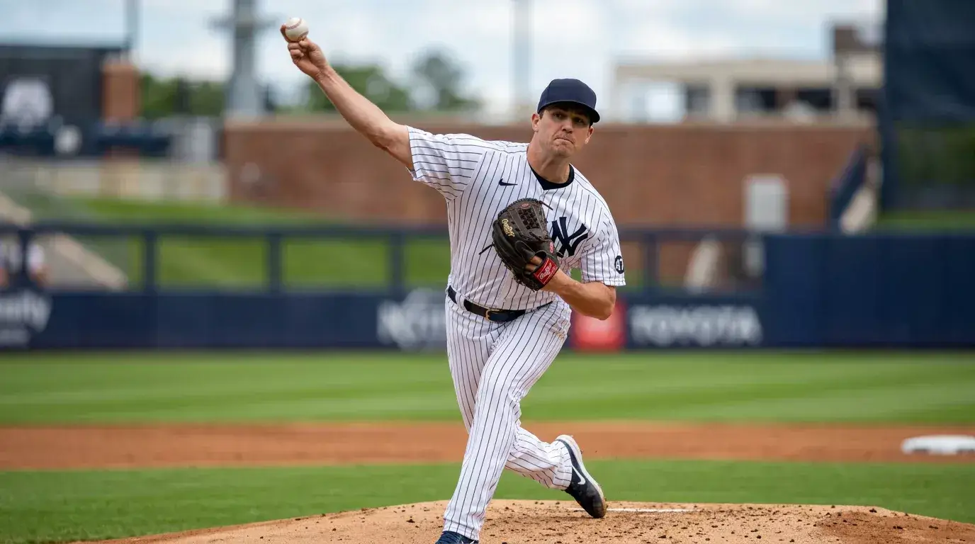 Major League Baseball starting pitcher mid-delivery from the mound, dirt and chalk lines visible